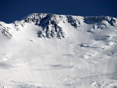 05A Lenin Peak summit area shines white in the afternoon sun from Ak-Sai Travel Lenin Peak Camp 1 4400m